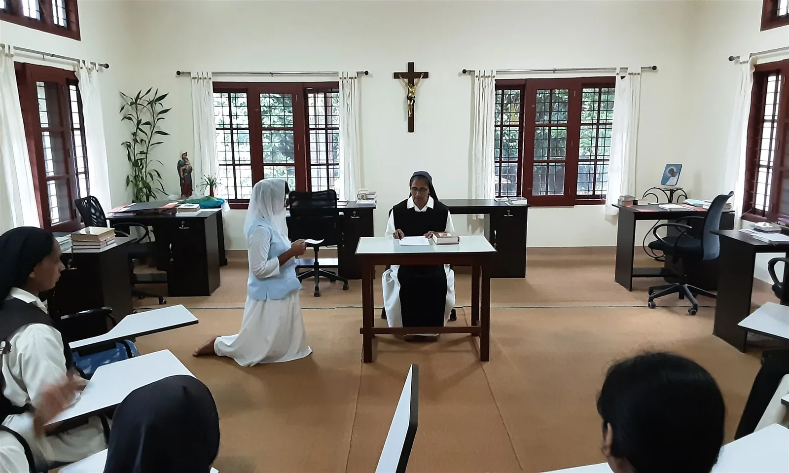 A formation ceremony in the chapter room at Ananda Matha