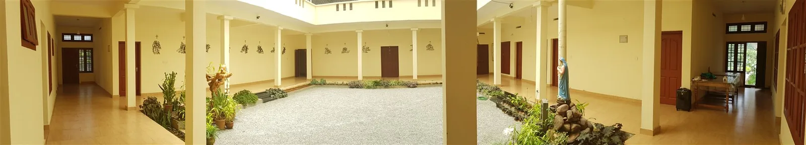 Panoramic view of the inner cloister at Ananda Matha