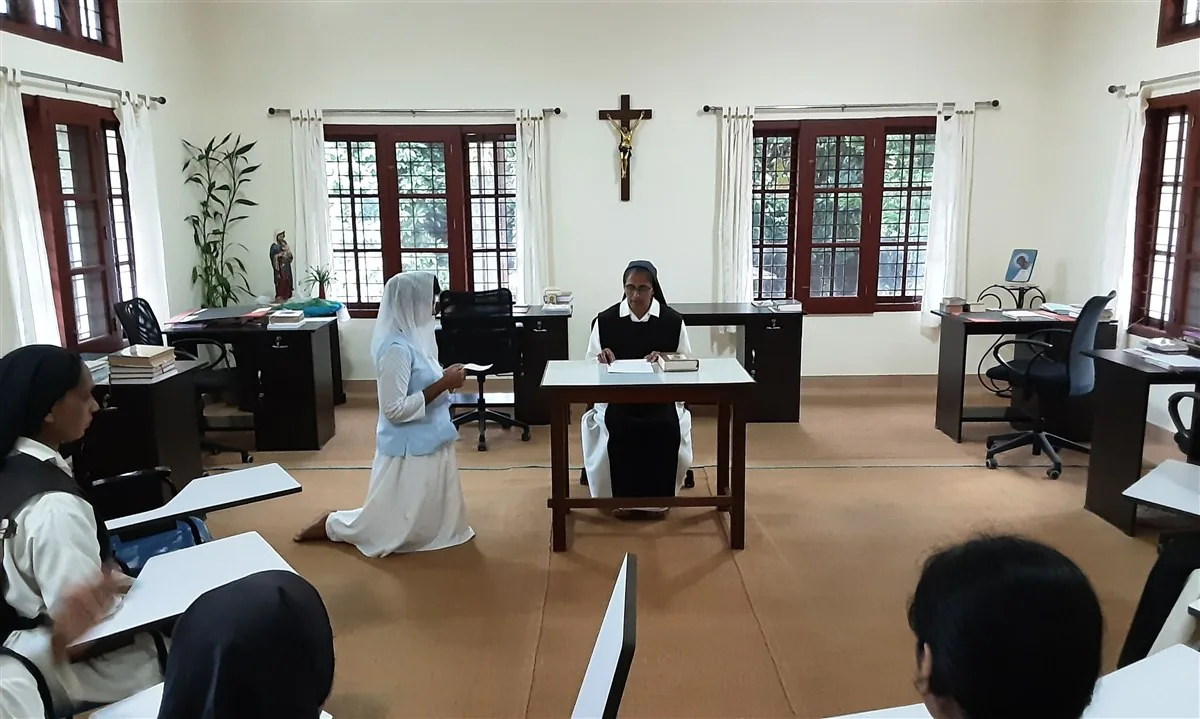 A formation ceremony in the chapter room at Ananda Matha