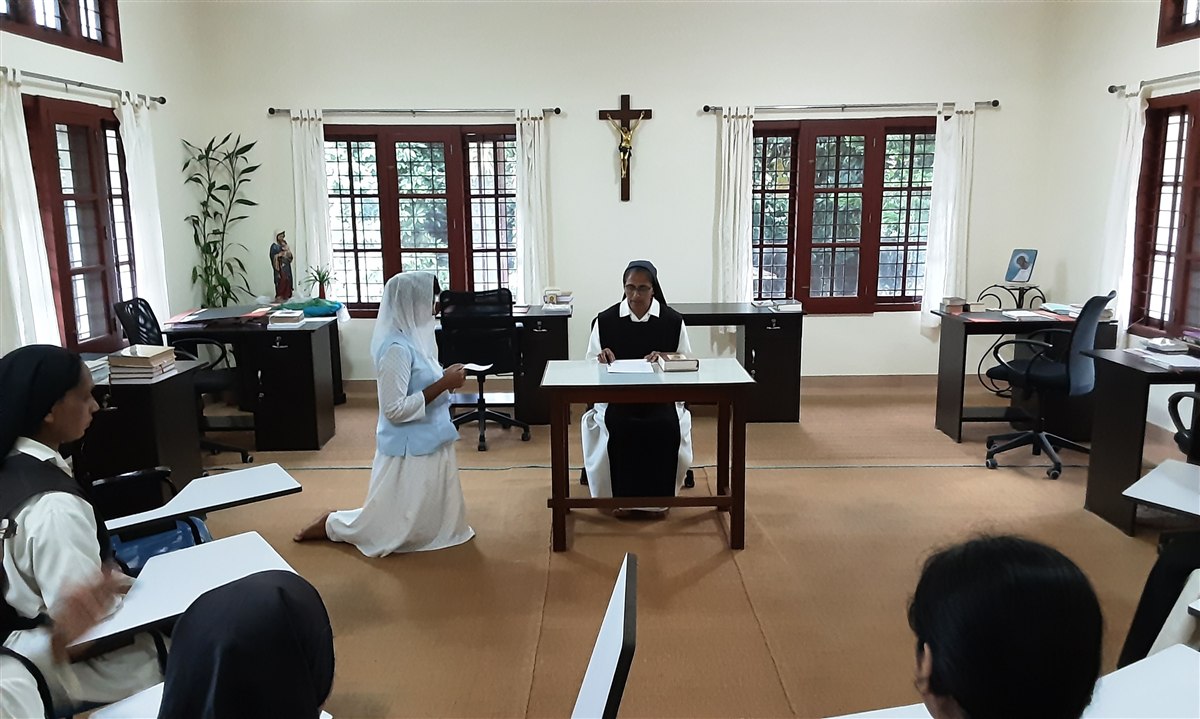 A formation ceremony in the chapter room at Ananda Matha